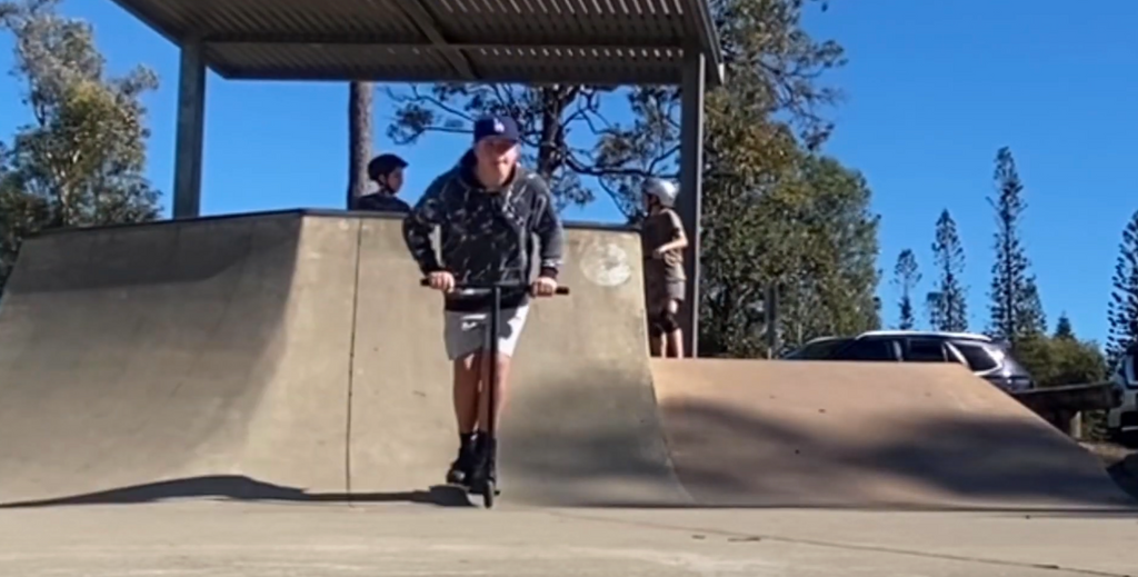 scooter rider at a skatepark