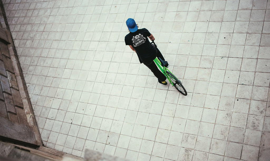 bmx rider wearing a black wild riders tshirt